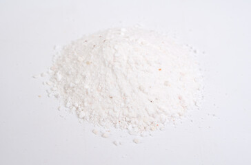 Dolomite mineral powder heep on white background.