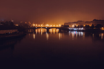 Vltava river at night. Bridge in Prague. Traveling, historic architecture concept