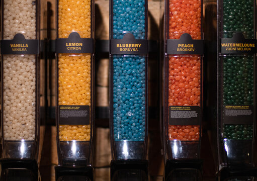 Organizers with candies with a dispenser in the store. - Powered by Adobe