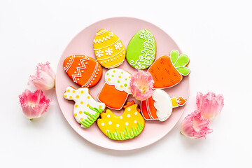 Easter cookies eggs and bunny on plate. Happy Easter background