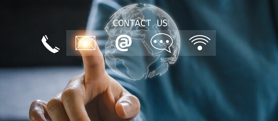 Hand of call center touching on screen contact us, email, address, operator, customer, suppor,...