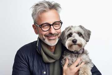 Studio portrait of happy mature man and his pet dog smiling.  Generative AI. 