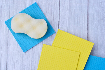Dishwashing sponge and kitchen wipes on white background. Sponges for dishes. Cleaning concept	