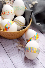 Decorated Easter eggs in a basket.