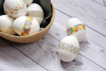 Decorated Easter eggs in a basket.
