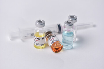 Vaccine bottle. Syringe on white background. Vaccination against quarantine coronavirus or covid-19, virus prevention and infection control. drug therapy concept