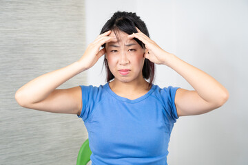 Asian woman having sinusitis. Medicine