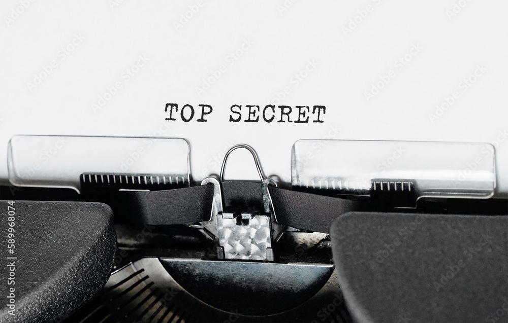 Poster text top secret typed on retro typewriter