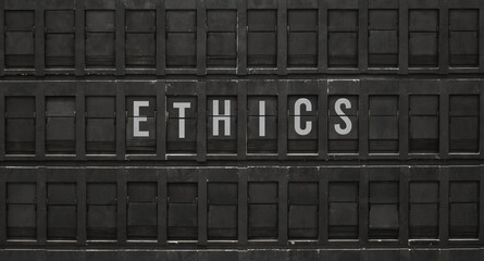Flip board with text Ethics
