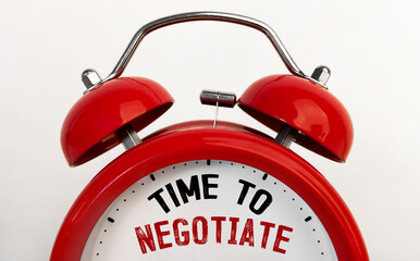 Red alarm clock with text Time To Negotiate