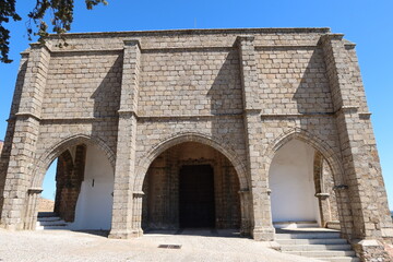 Fototapeta na wymiar Aracena, Huelva, Spain, March 30, 2023: Rear portico of Our Lady of Greater Sorrow church in Aracena, Huelva. Spain