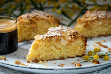 Almond pie. Pieces of cake made from almond flour and coconut flakes.
