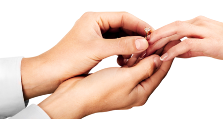 Close up Groom Putting the Wedding Ring on bride's finger