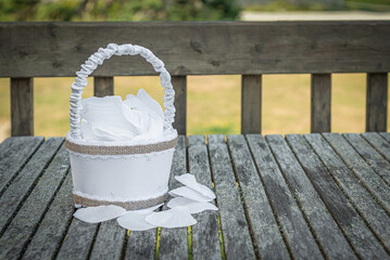 The White Satin Flower Girl Basket  Wrapped with Burlap Ribbon