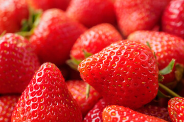 Fresh organic red strawberry fruit background