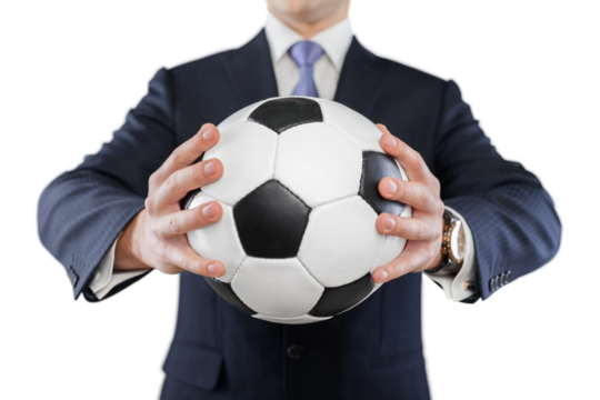 Young business man holding fotball ball isolated on white background
