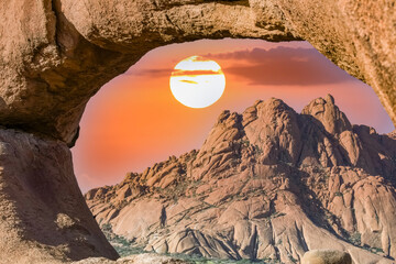 Namibian the stone arch of Spitzkoppe, sunset