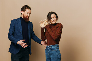 Man and woman couple in a relationship quarrel, yelling, psychological violence in the family, problems in a real relationship between people