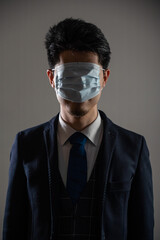 Man wearing a mask over his eyes.