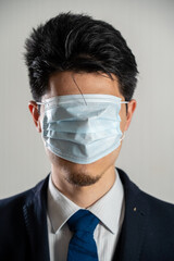 Man wearing a mask over his eyes.
