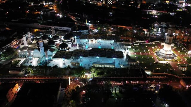 AH - 4K Night Aerial view of Baiturrahman the Beautiful Mosque in Indonesia