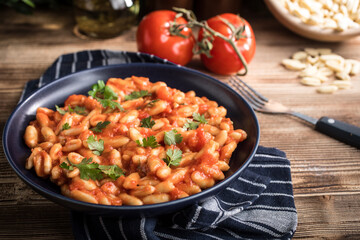 Cavatelli pasta with fresh tomato sauce.