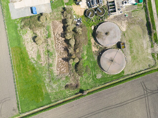 Aerial view of a pair of old sewage treatment purification systems. Now not used, the sewage plant has recently been upgraded to the latest purification systems.