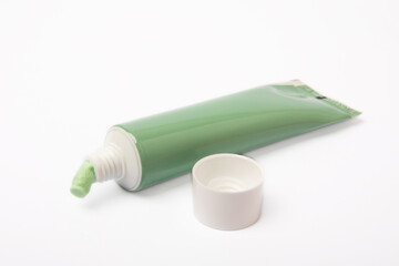  Tube of toothpaste isolated on white background. Close-up. Prevention of dental plaque and caries. Fresh breath. Dentistry concept. Oral care.