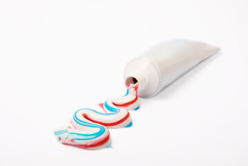  Tube of toothpaste isolated on white background. Close-up. Prevention of dental plaque and caries....