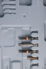 tools. on a light building bits and nozzles for a screwdriver. for advertising banners of construction label stores and more