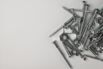 tools. on a light background, construction and fasteners, bolts, nuts and more. for advertising banners of construction label stores and more