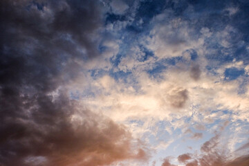 Fototapeta premium clouds and sun at sunset