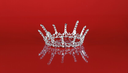 princess crown isolated on red background © serikbaib
