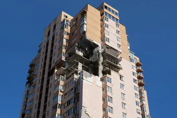 Foto op Canvas Russian missile damaged multi-storey dwelling building in Kiev city, Ukraine © Harmony Video Pro
