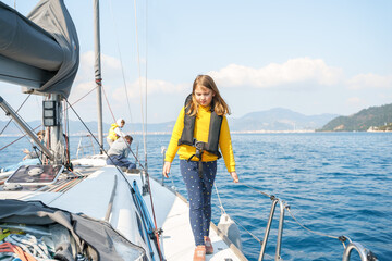 Voyage sail on sport sea luxury yacht. Yachting family summer vacation cruise. Children, sailor kid...