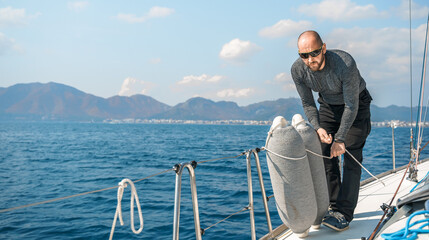 Voyage race sail on professional sport sea yacht. Mooring fender. Yachting summer vacation cruise....