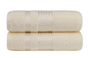multicolored terry towels, rolled up and stacked on the table