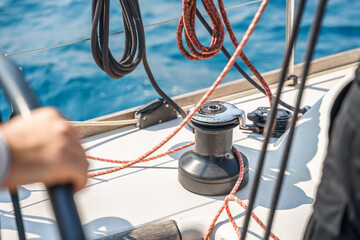 Voyage race sail on professional sport sea yacht. Yachting summer vacation cruise . Captain...