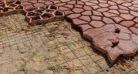laying paving slabs using templates