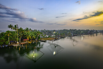 Beautiful sunrise view from Kadamakkudy landscape backwater, Kerala.