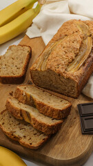 fresh banana bread lies on a gray background close-up