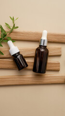dark glass bottles for cosmetics with a pipette lie on wooden boards