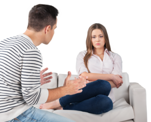 Young couple arguing while sitting at home