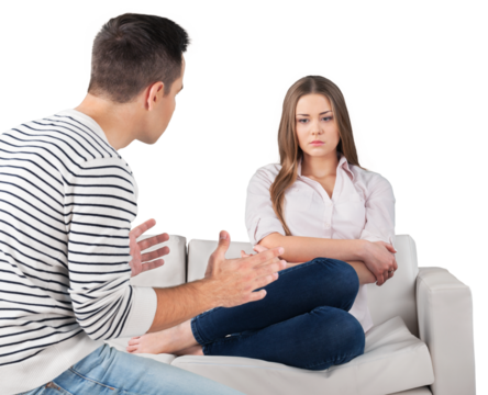 Young couple arguing while sitting at home