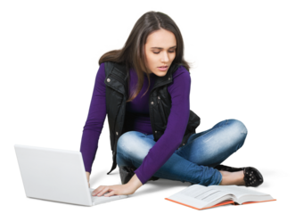 Beautiful girl using laptop while sitting and looking at book on a white background