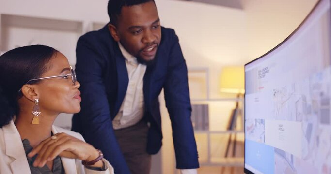 Business people, teamwork and training on computer screen at night for collaboration, planning or strategy at office. Businessman and woman working late in web design on desktop PC at workplace