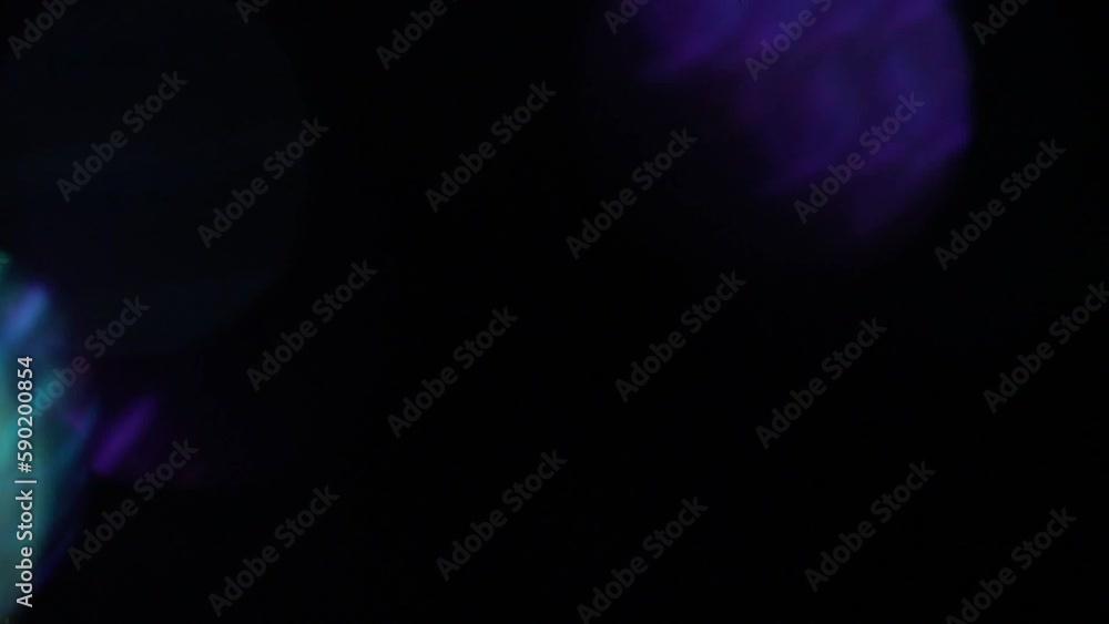 Canvas Prints shimmering electric bokeh transition. mint, blue and purple bokeh circles fading motion on black. de