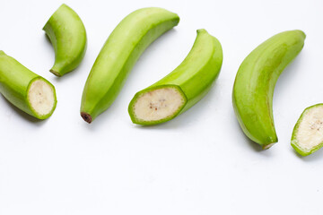 Raw banana isolated on white background.