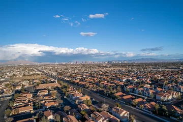 Rolgordijnen Las Vegas Districts of Las Vegas from drone during sunny day. Aerial view of fabulous Las Vegas, neighborhoods on the outskirts city.