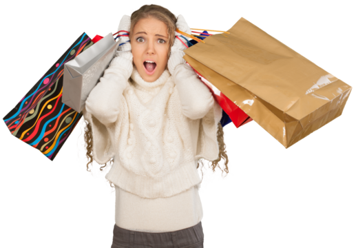 Beautiful girl screaming and holds her head, with shopping and gifts in hands isolated on white background